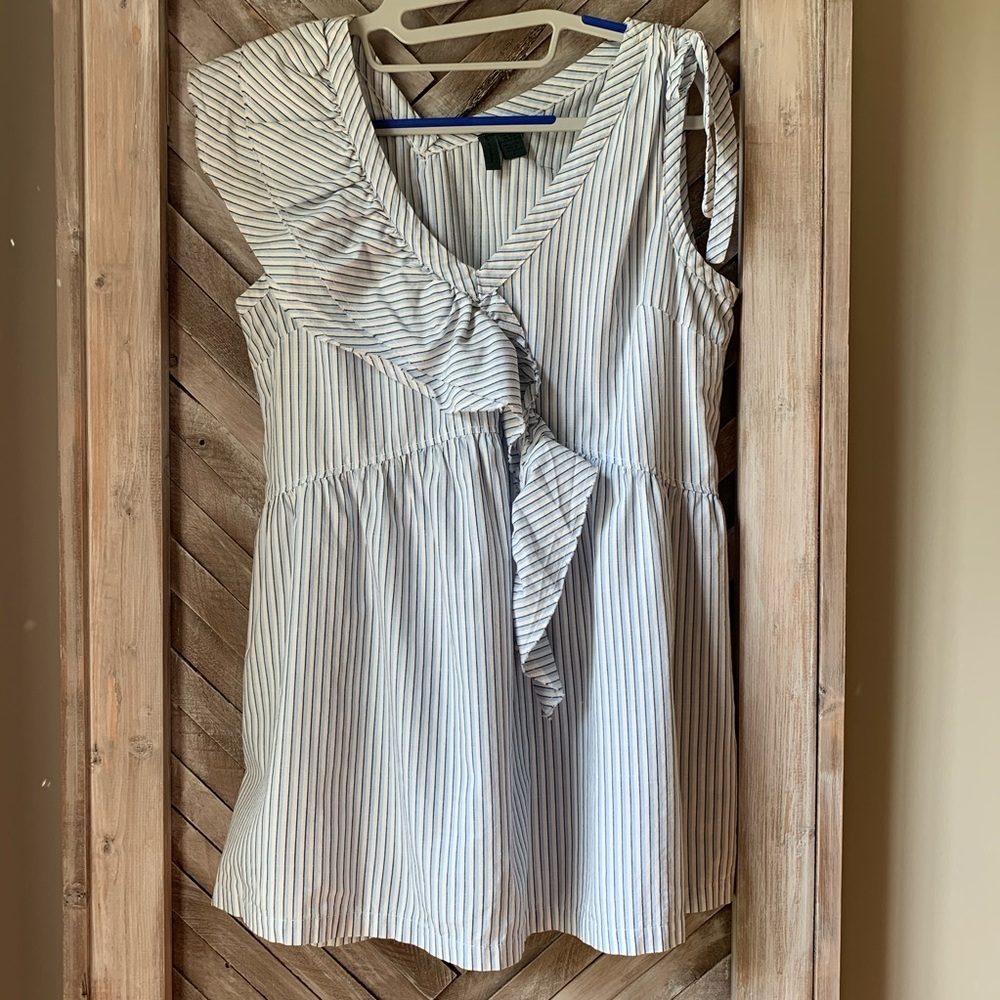 Anthropologie sleeveless top with ruffle detail.